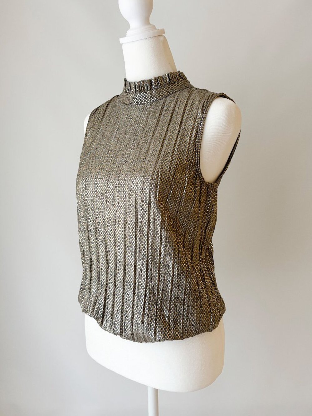 gold and grey ribbed ruffled high neck sleeveless top